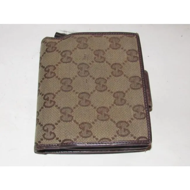 Gucci Brown Large G Logo Print Coated Canvas And Brown Leather With A Gold Abbey D Ring Accent Vinta