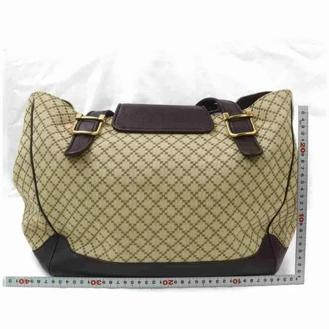 Gucci, brown on tan diamante print canvas and brown leather, XL '1973' top handle shoulder bag with a bold gold GG accent