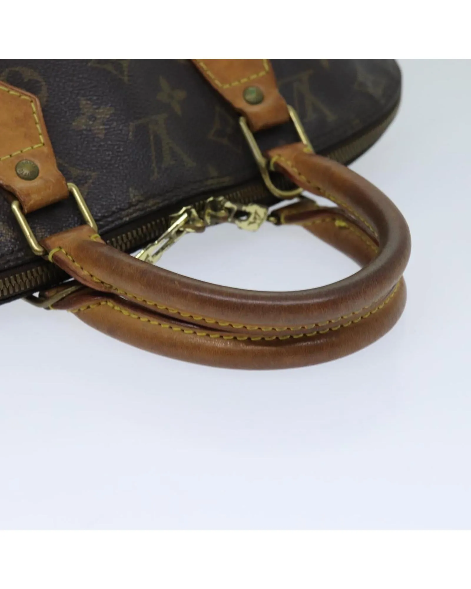 LOUIS VUITTON Alma PM Monogram Canvas Handbag Brown