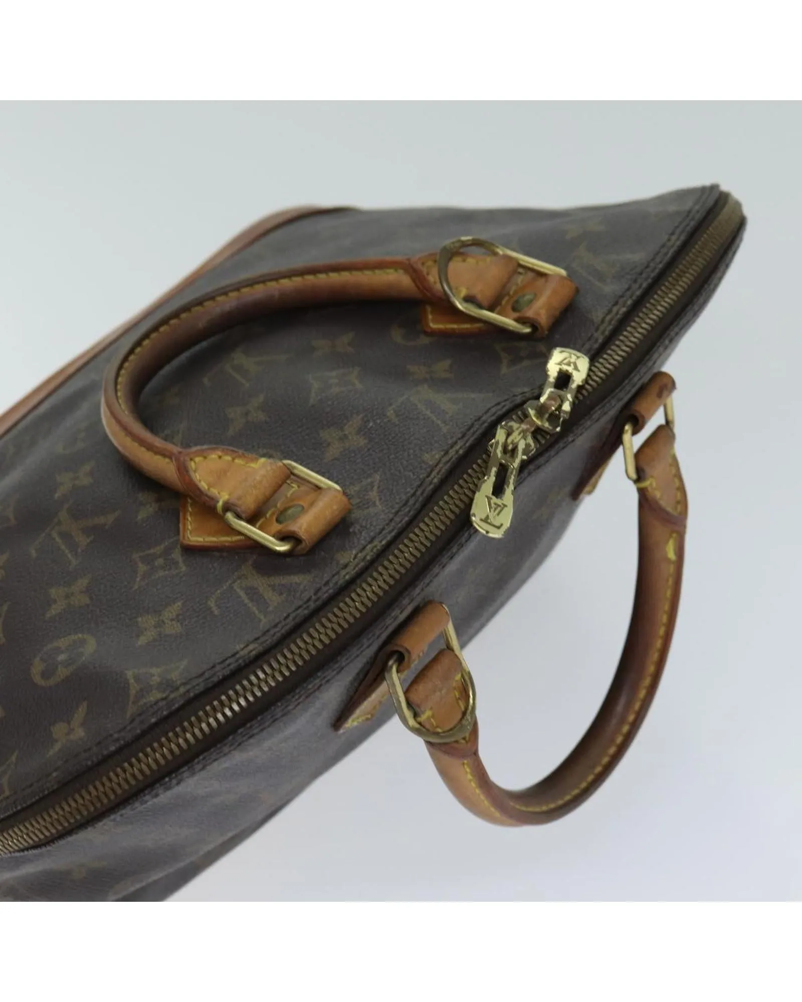 LOUIS VUITTON Alma PM Monogram Canvas Handbag Brown