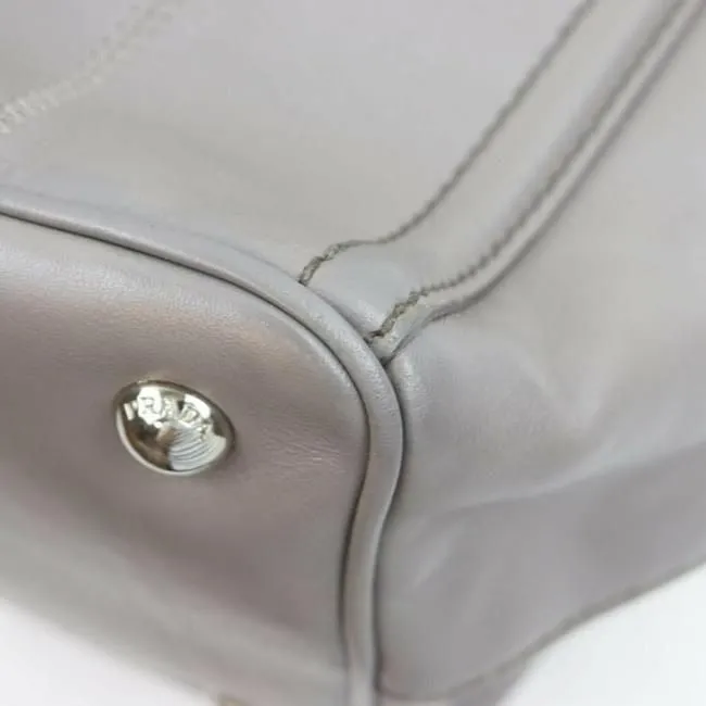 Prada Vitello Daino Top Handle Two Way Grey Leather Chrome Satchel