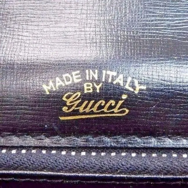 RARE, vintage Gucci, mod, black leather, two-way top handle style purse with gold tone accents