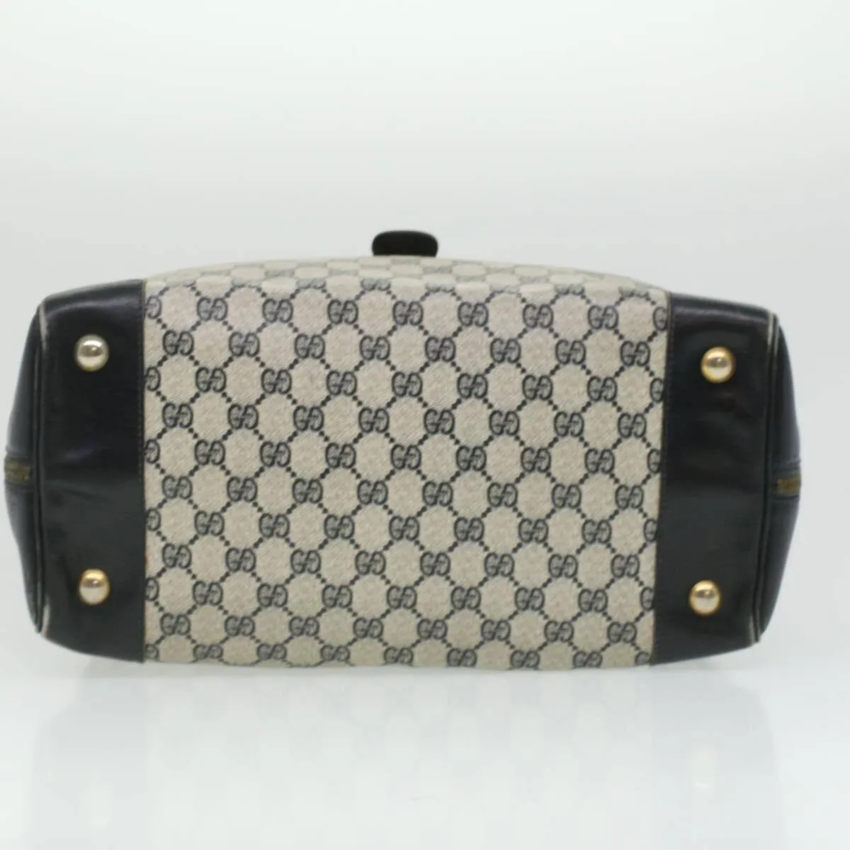 Very unusual, Gucci, blue Guccissima print & navy leather with wide red and blue striped corners, a footed bottom, dual zip closure top